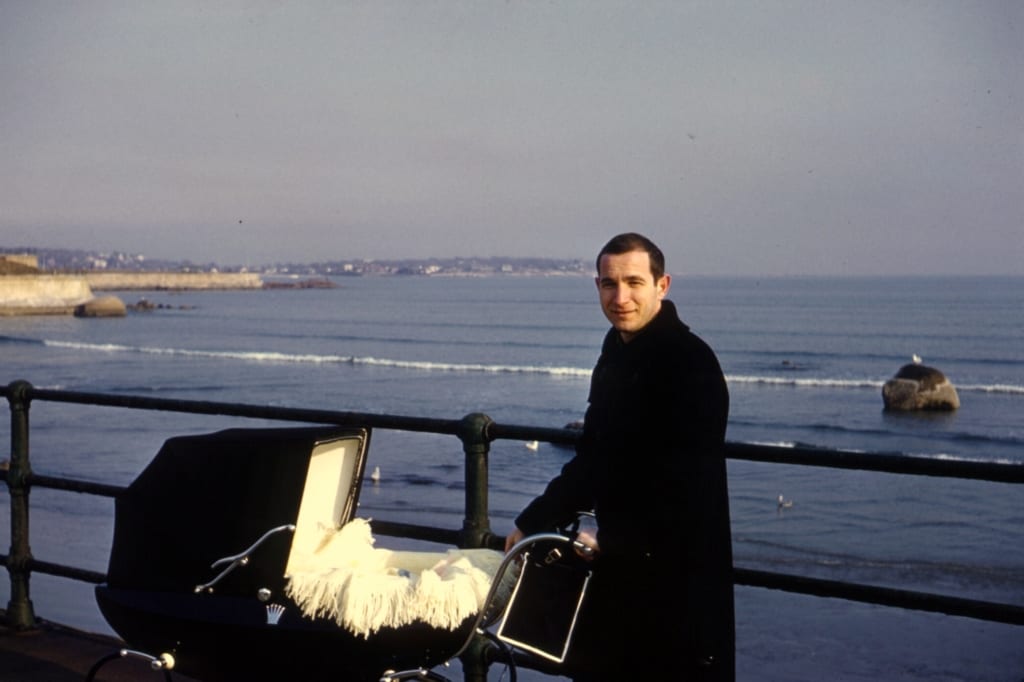 A vintage Dad and his vintage pram