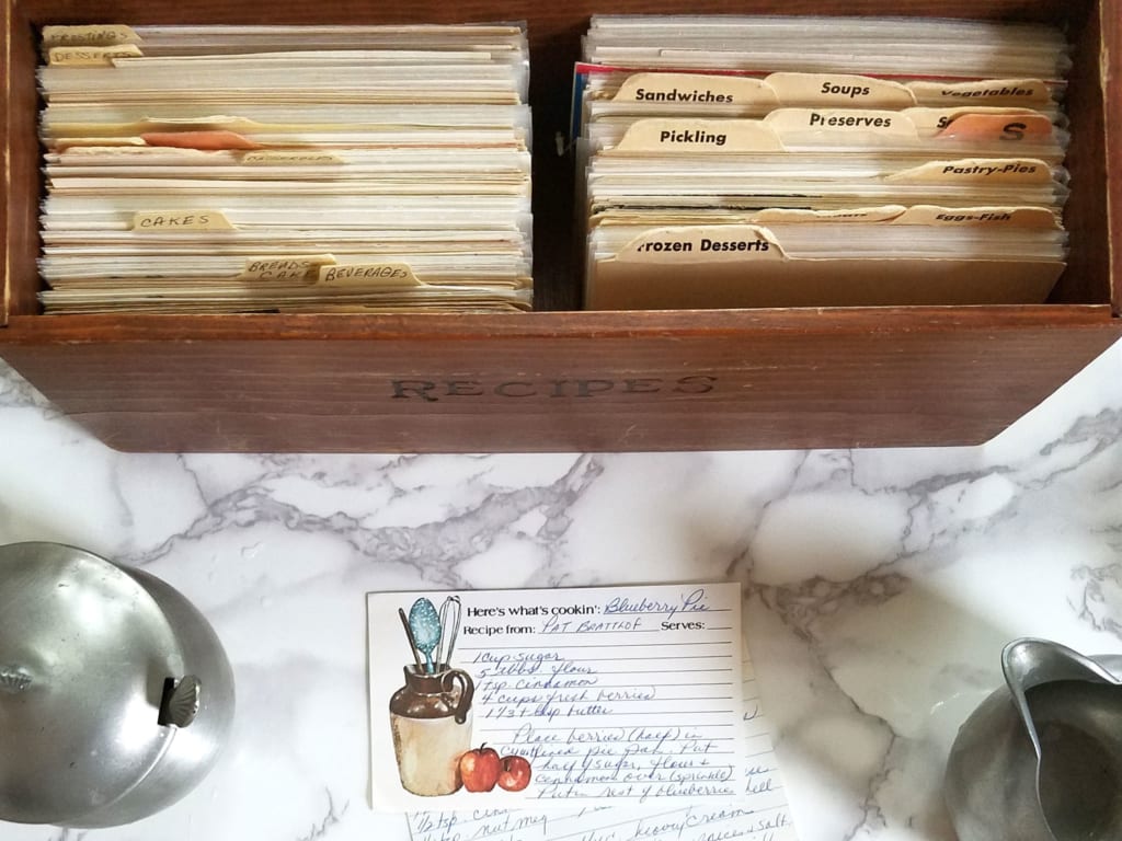 organizing recipe cards in kitchen