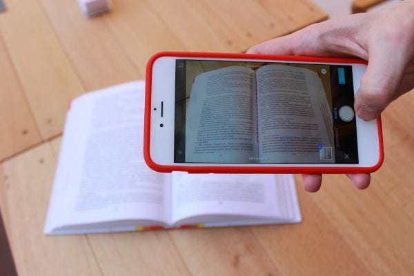 person using mobile app on smartphone for document imaging