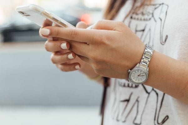 hands holding phone