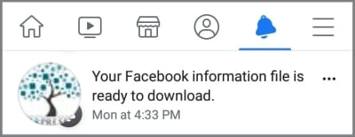 screenshot of the Facebook app notifications section with an alert that says Your Facebook information file is ready to download