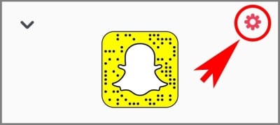screenshot of Snapchat user screen with an arrow pointing to the settings icon