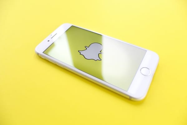 smartphone displaying snapchat logo on screen