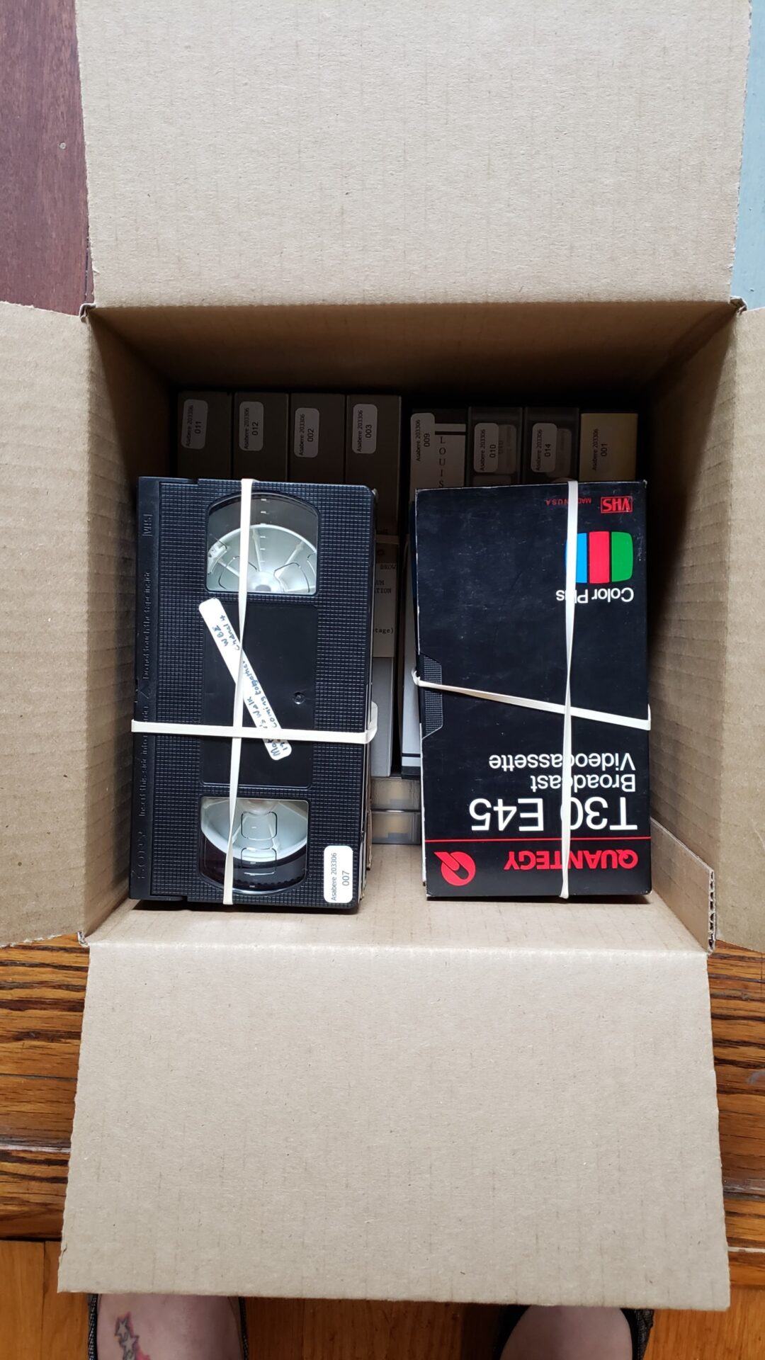 VHS video cassettes packed for shipping