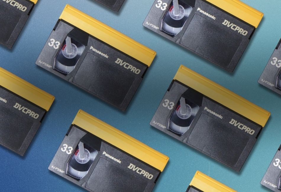 8mm video tapes and cases scattered on the floor