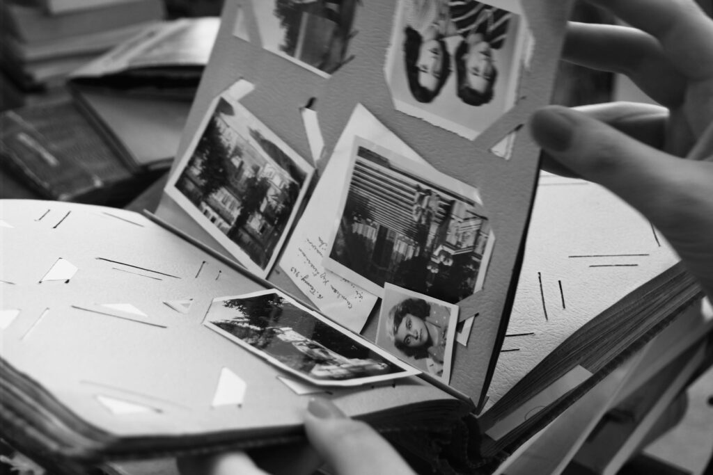 Explore a classic black and white photo album, capturing timeless memories in a nostalgic format.